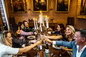 Family having dinner ar the castle